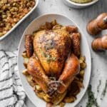 Juicy Roasted Thanksgiving Turkey with Aromatic Carrots, Apples, and Herbs Recipe
