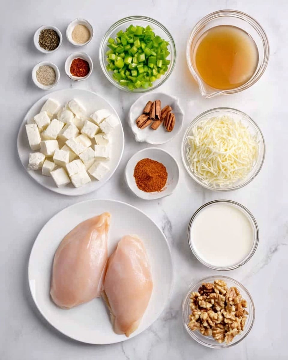 The image shows all ingredients neatly arranged on a white marbled surface. In the center front, there is a white plate with two raw chicken fillets with smooth, pale pink skin. To the left, a white plate holds small white cubes of a soft cheese. Behind the plates, from left to right, small white bowls hold a mix of spices including ground black pepper, chili powder, and small dried cinnamon sticks. There is a bowl of chopped green bell peppers and a bowl of chopped fresh green herbs behind them. Taller clear containers show shredded cheese and light brown chicken broth. A small white bowl contains thick white cream, and next to it, small white bowls hold minced onions and walnuts. The items are spaced evenly and clearly visible. photo taken with an iphone --ar 4:5 --v 7