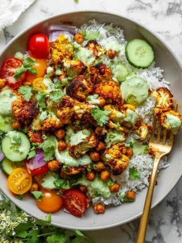 Cauliflower Shawarma Bowls with Crispy Chickpeas and Green Tahini Sauce Recipe