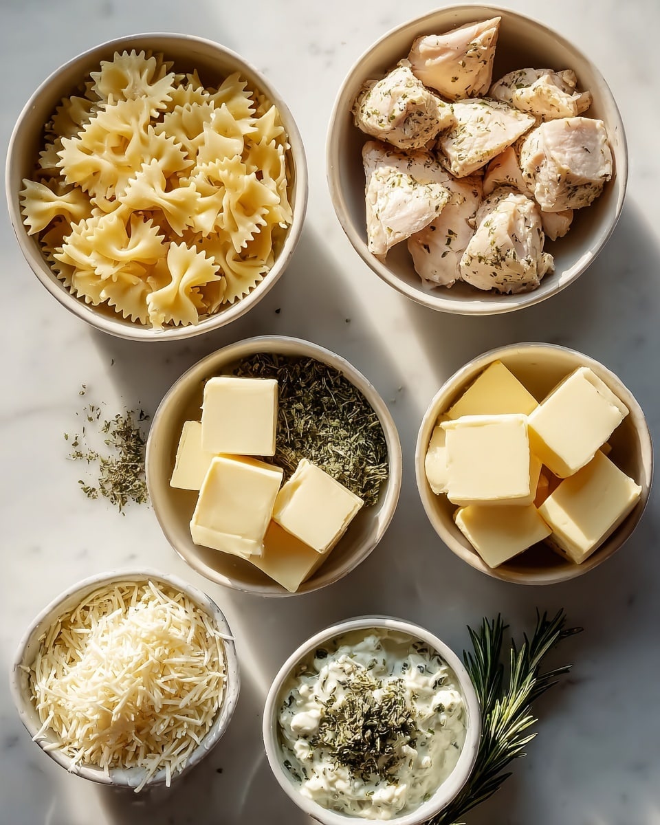 Seven bowls sit on a white marbled surface, each with different ingredients. The top left bowl is filled with pale yellow farfalle pasta, showing its bowtie shape and slight ridges. To the right, a bowl holds pieces of white, cooked chicken sprinkled with green dried herbs. Below the chicken, a bowl has a fluffy pile of white shredded cheese with a soft texture. Next to it on the right, a small bowl contains fresh rosemary sprigs and other green herbs. To the left of the cheese, a small bowl holds creamy white cheese with blue mold patches. Below that, another small bowl contains dried green herbs. On the bottom right, a larger bowl is full of neat cubes of pale yellow butter, while to the left, a smaller bowl also has blocks of pale yellow butter with smooth surfaces. The natural light highlights the textures and colors subtly, photo taken with an iphone --ar 4:5 --v 7