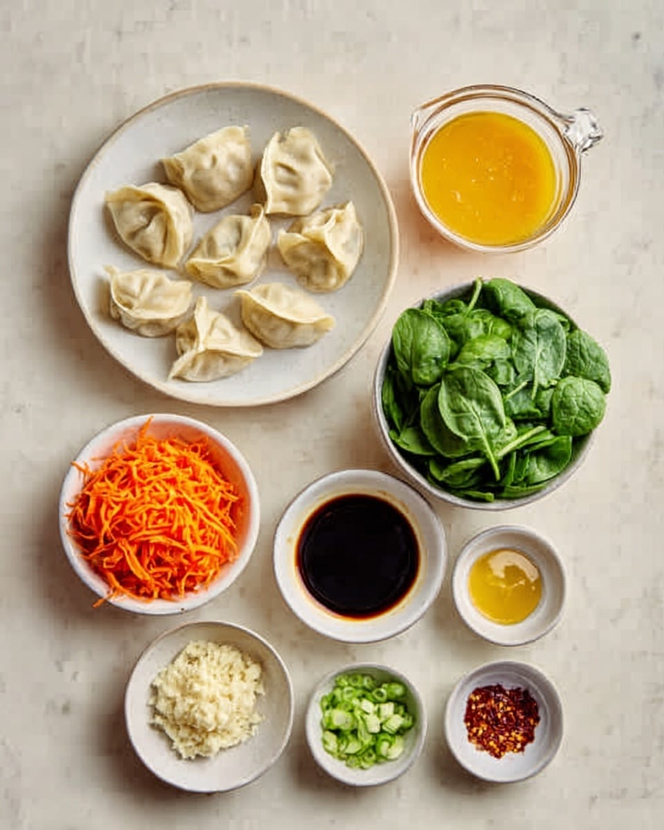 A white round plate at the top left filled with folded dumplings that have a soft, pale dough texture. To the right of it is a clear glass cup with a yellow-orange sauce that looks smooth and thick. Below the plate, a small white bowl holds finely shredded bright orange carrots. Next to the carrots, a white bowl contains fresh bright green spinach leaves. Below the carrots, a small white bowl is filled with minced light brown garlic. To the right of it, a white round bowl with thick dark brown soy sauce. Next to it, a small white bowl holds coarse white salt. Below those, from left to right, three small white bowls contain chopped green spring onions, golden honey with a smooth texture, and red chili flakes with a coarse texture. All bowls and plate are on a white marbled surface photo taken with an iphone --ar 4:5 --v 7