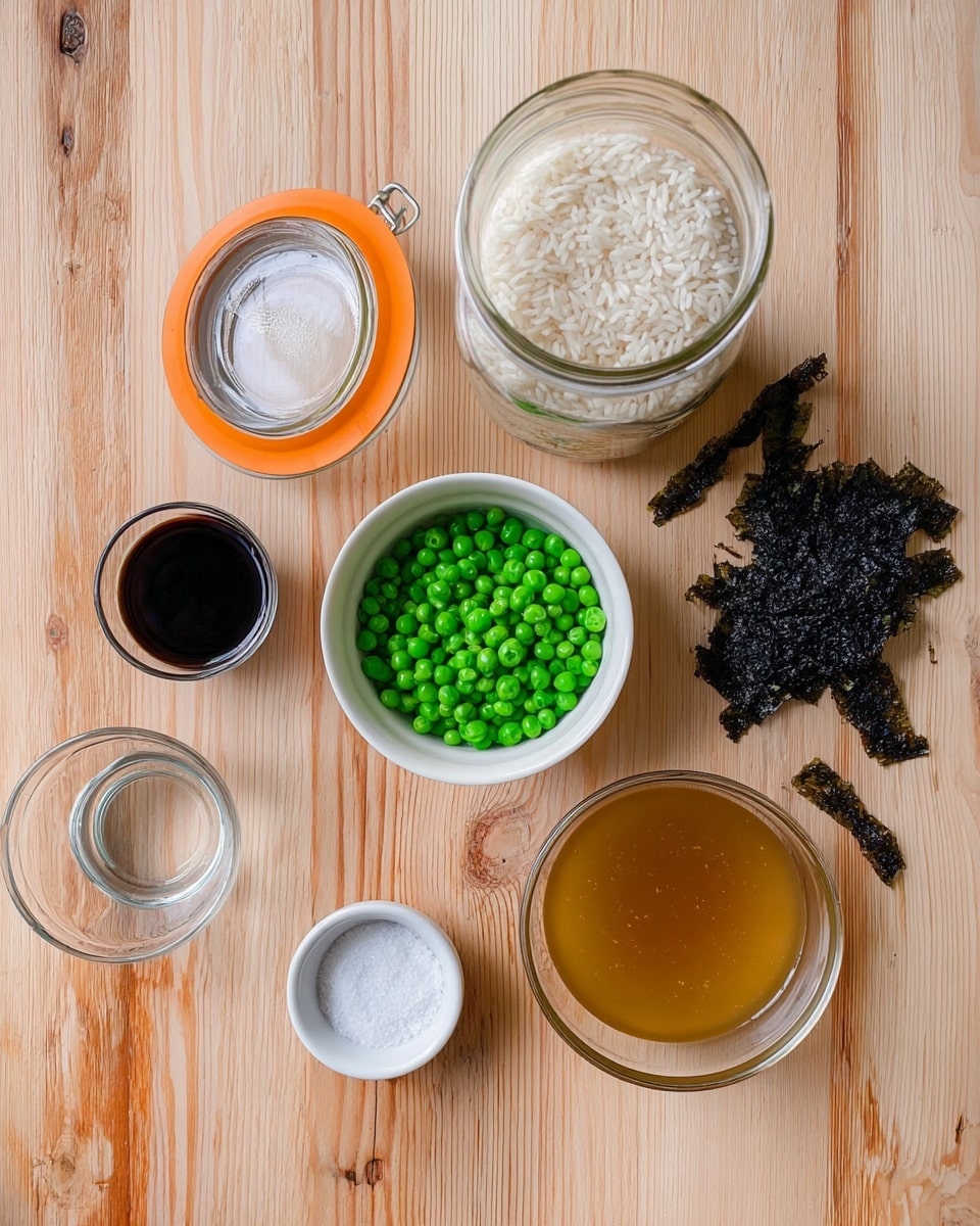 The image shows several cooking ingredients arranged on a wooden table with a light natural wood color. There is a large glass jar with an orange lid filled with white rice at the top center. Below it, a small white bowl filled with bright green frozen peas sits next to a smaller white bowl containing black sesame seeds. To the right of the peas, there are some dark dried seaweed strips laid flat. On the right side, there is a clear glass bowl filled with light brown broth. To the left of the peas, there is a small glass cup with dark soy sauce, and below it, a small clear bowl with water. A tiny white bowl with white salt is positioned near the bottom center. The whole scene is on a wooden surface which should be replaced with a white marbled texture. Photo taken with an iphone --ar 4:5 --v 7