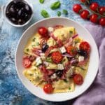 Ravioli Pasta Salad with Cherry Tomatoes, Mozzarella, Salami, and Zesty Dressing Recipe