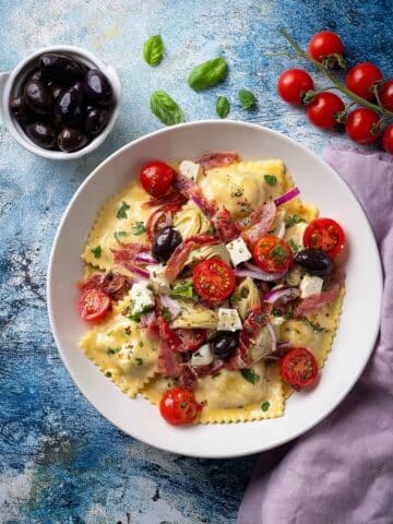 Ravioli Pasta Salad with Cherry Tomatoes, Mozzarella, Salami, and Zesty Dressing Recipe